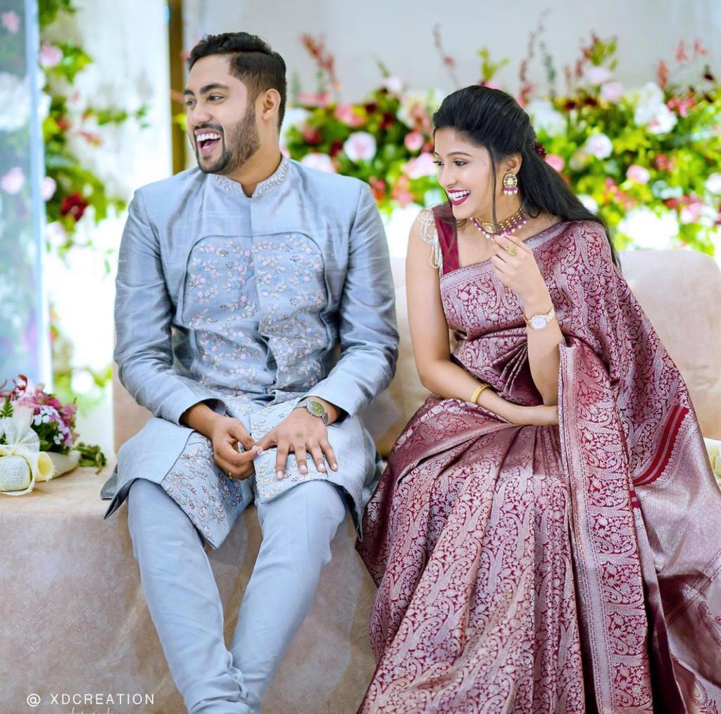 Elegant Maroon Silk Saree with All-Over Woven Motifs