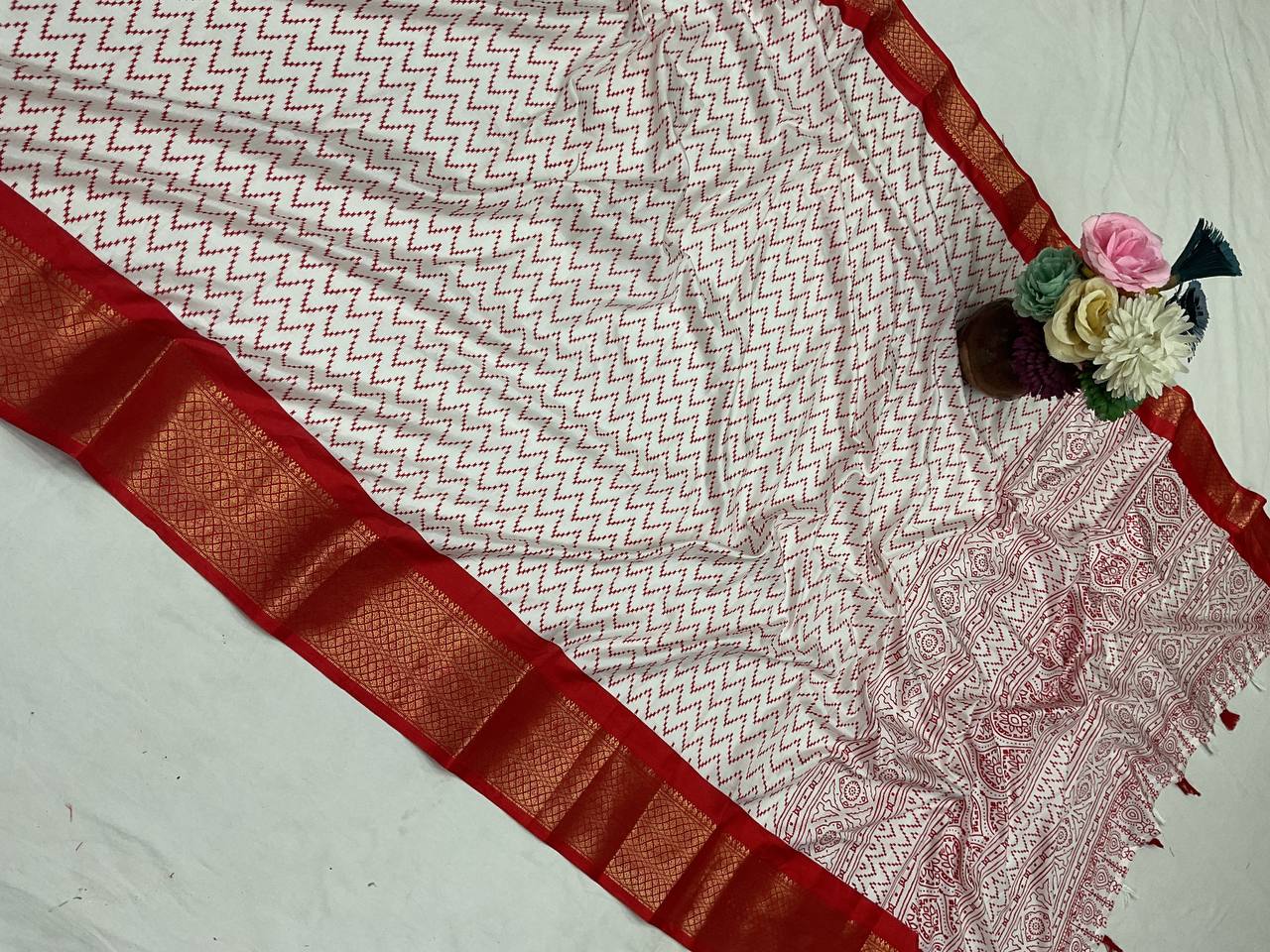 Pure Dola Silk Saree with HD Batik Print & Jacquard Border
